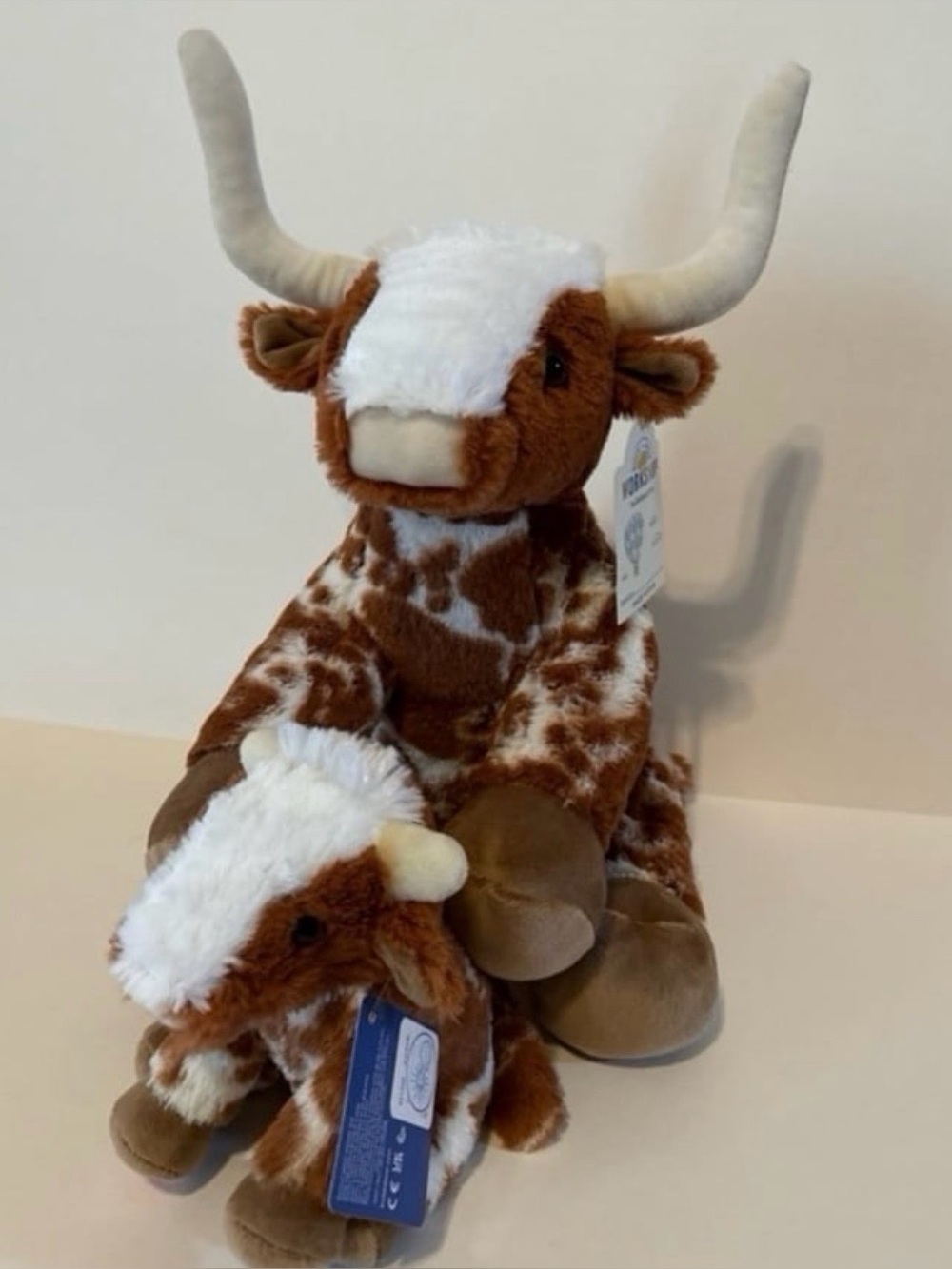 Build-A-Bear Longhorn Cow Plush Stuffed Animal and small longhorn buddy.